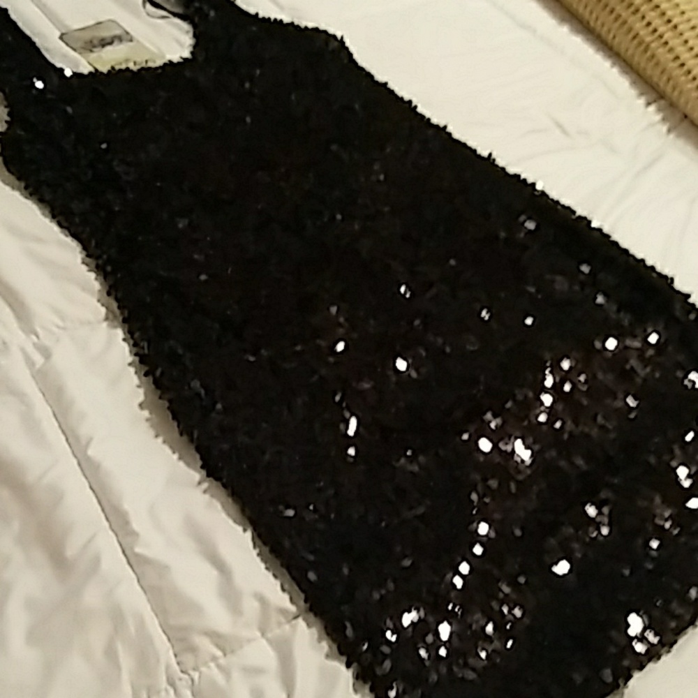 Black sequined dress.